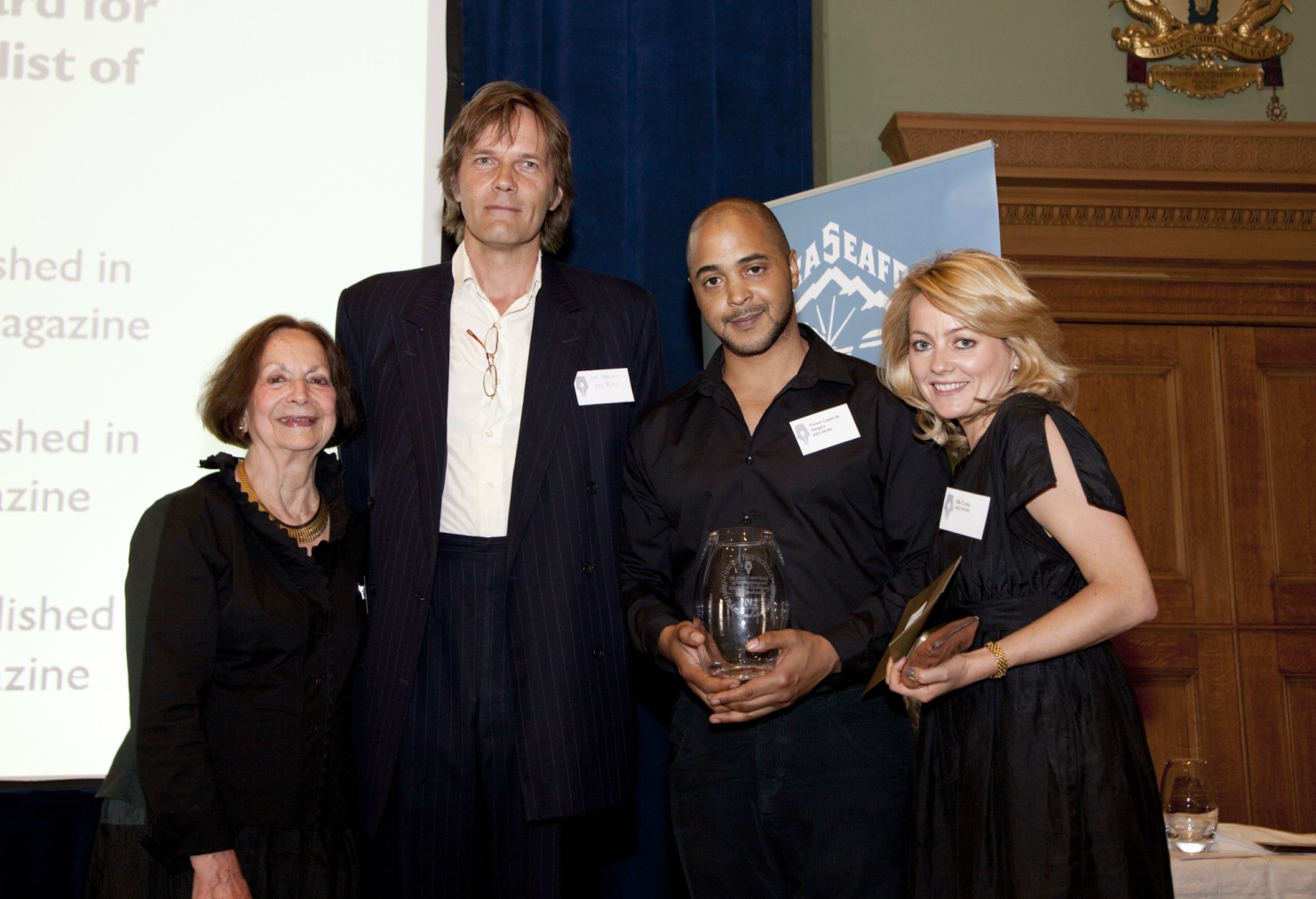 Claudia Roden presenting the Derek Cooper Award for Campaigning and Investigative Food Writing and Broadcasting to from left to right: Zam Baring, Trevor Lopez de Vergara and Ella Cosby from Keo Films